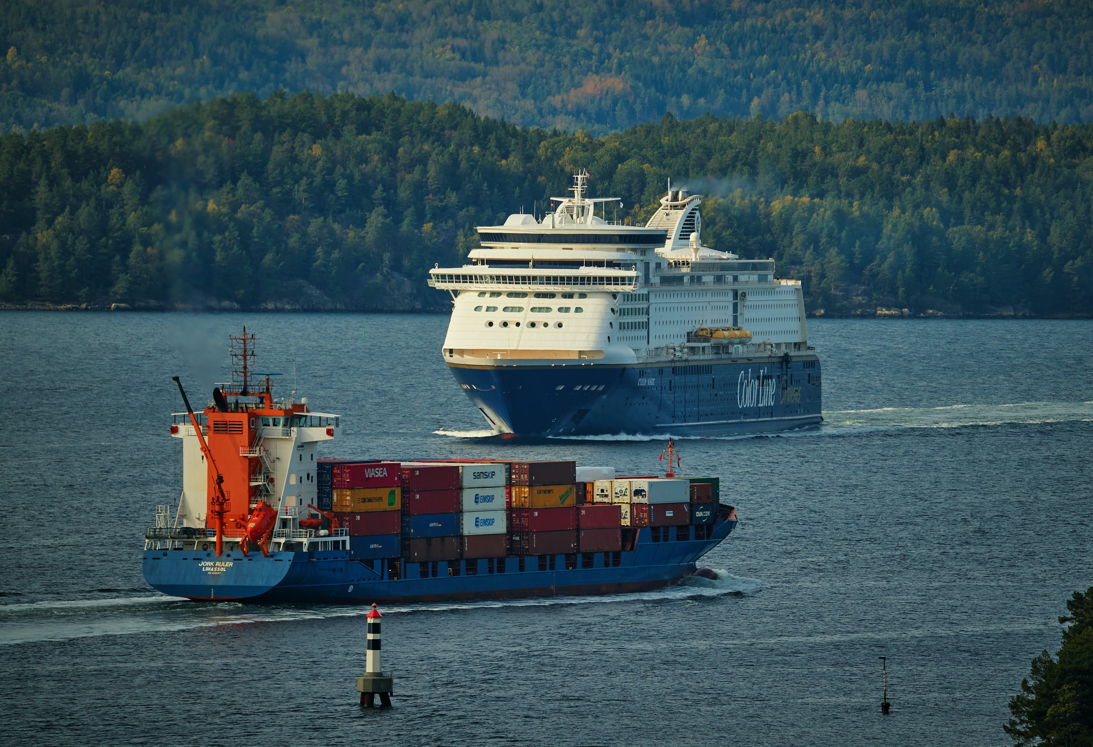 a cruise ship and a haulage ship