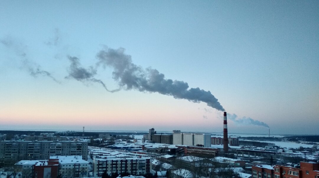 photo of tower emitting greenhouse gases