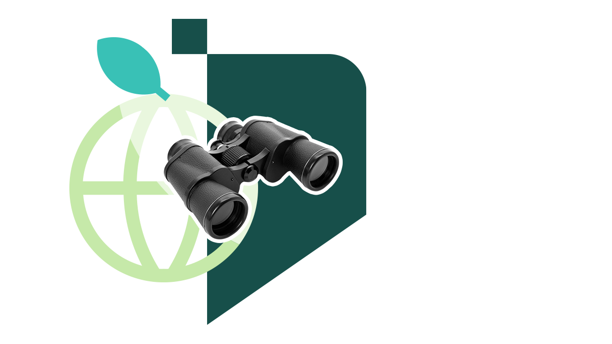 Black binoculars with green background  