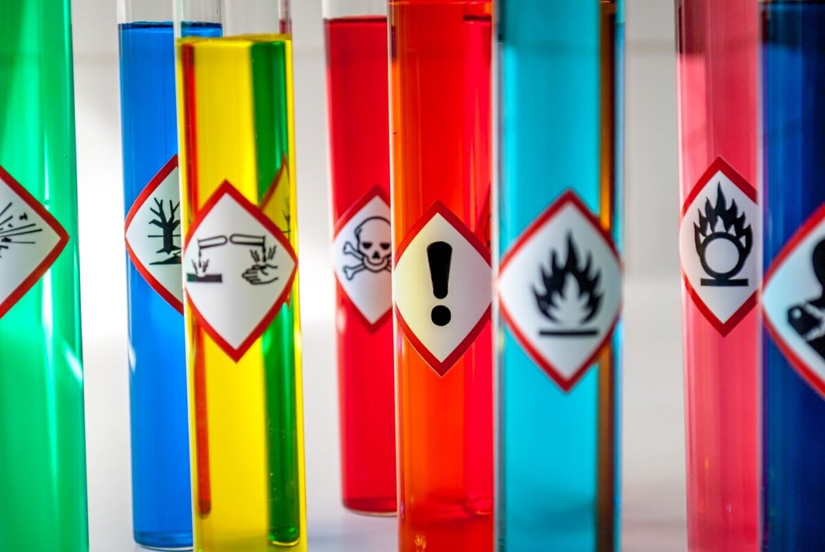 COSHH hazard symbols on vials of liquids