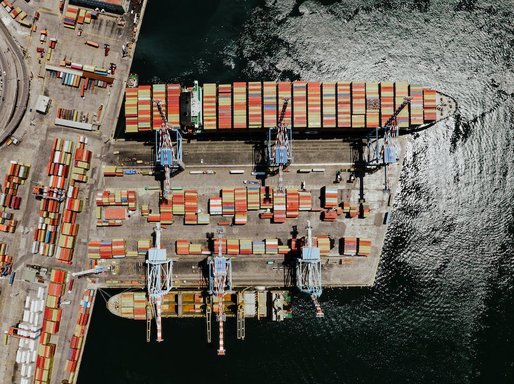 a bird's eye view of a shipping company at port