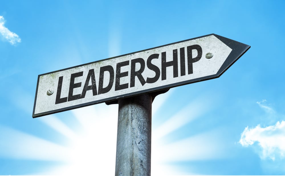 Leadership sign with sky background