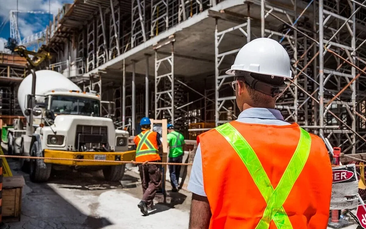 Pillar%202-%20SMS-%20Blog%20Man%20on%20construction%20site%20in%20white%20construction%20hat%20with%20truck%20in%20the%20background.jpg?width=1200&height=752&name=Pillar%202-%20SMS-%20Blog%20Man%20on%20construction%20site%20in%20white%20construction%20hat%20with%20truck%20in%20the%20background.jpg