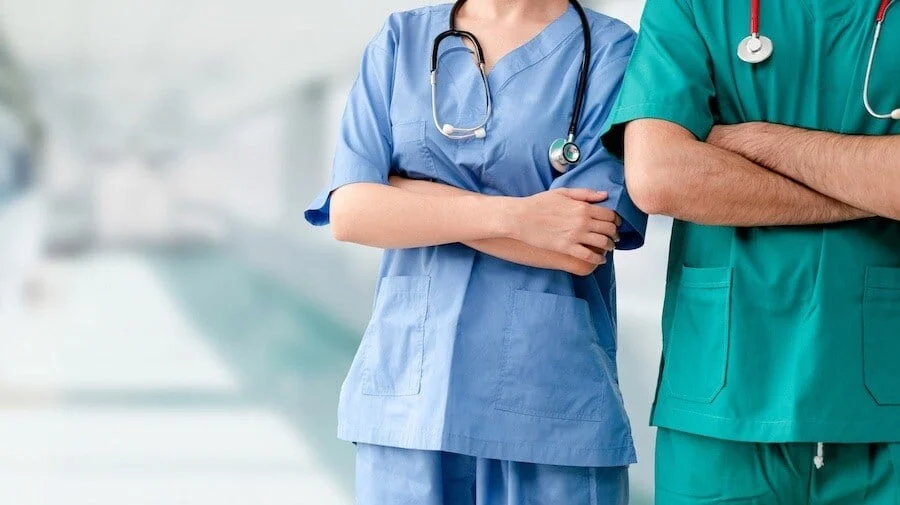 two20healthcare20workers20standing20next20to20eachother-1 (1)