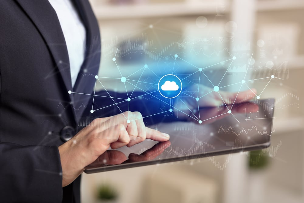 Business20woman20using20tablet20with20financial20cloud20connectivity20concept-1
