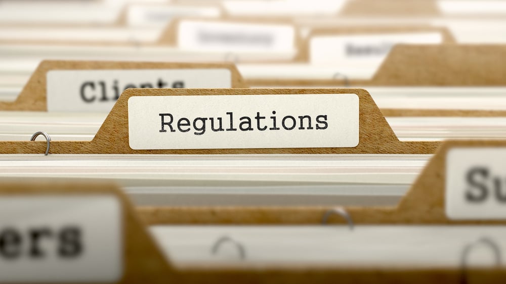 Regulations20Concept.20Word20on20Folder20Register20of20Card20Index.20Selective20Focus-1