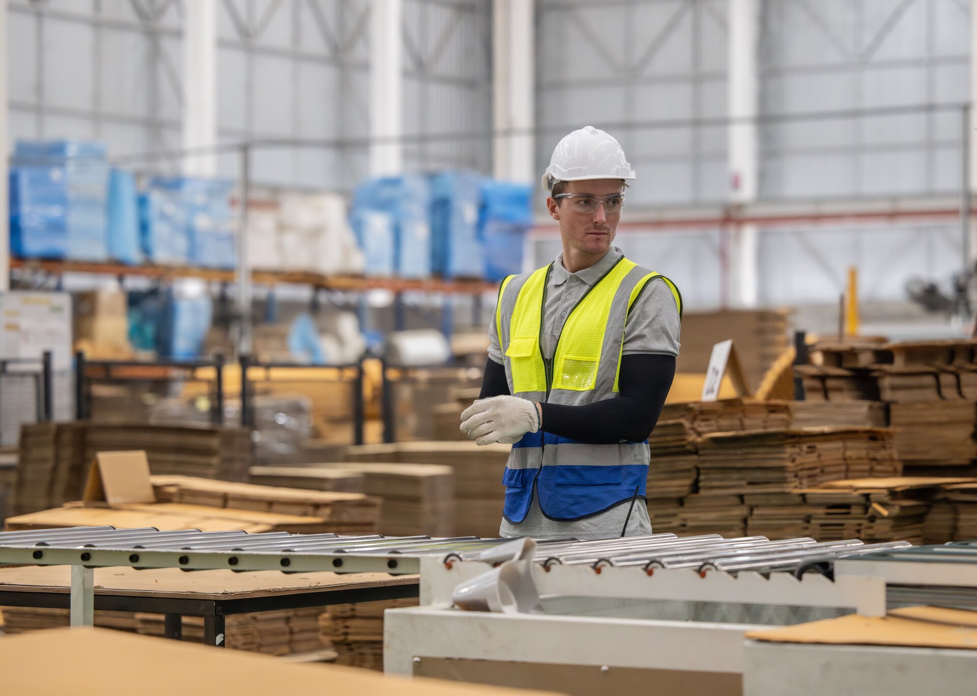 Man In Cardboard Factory