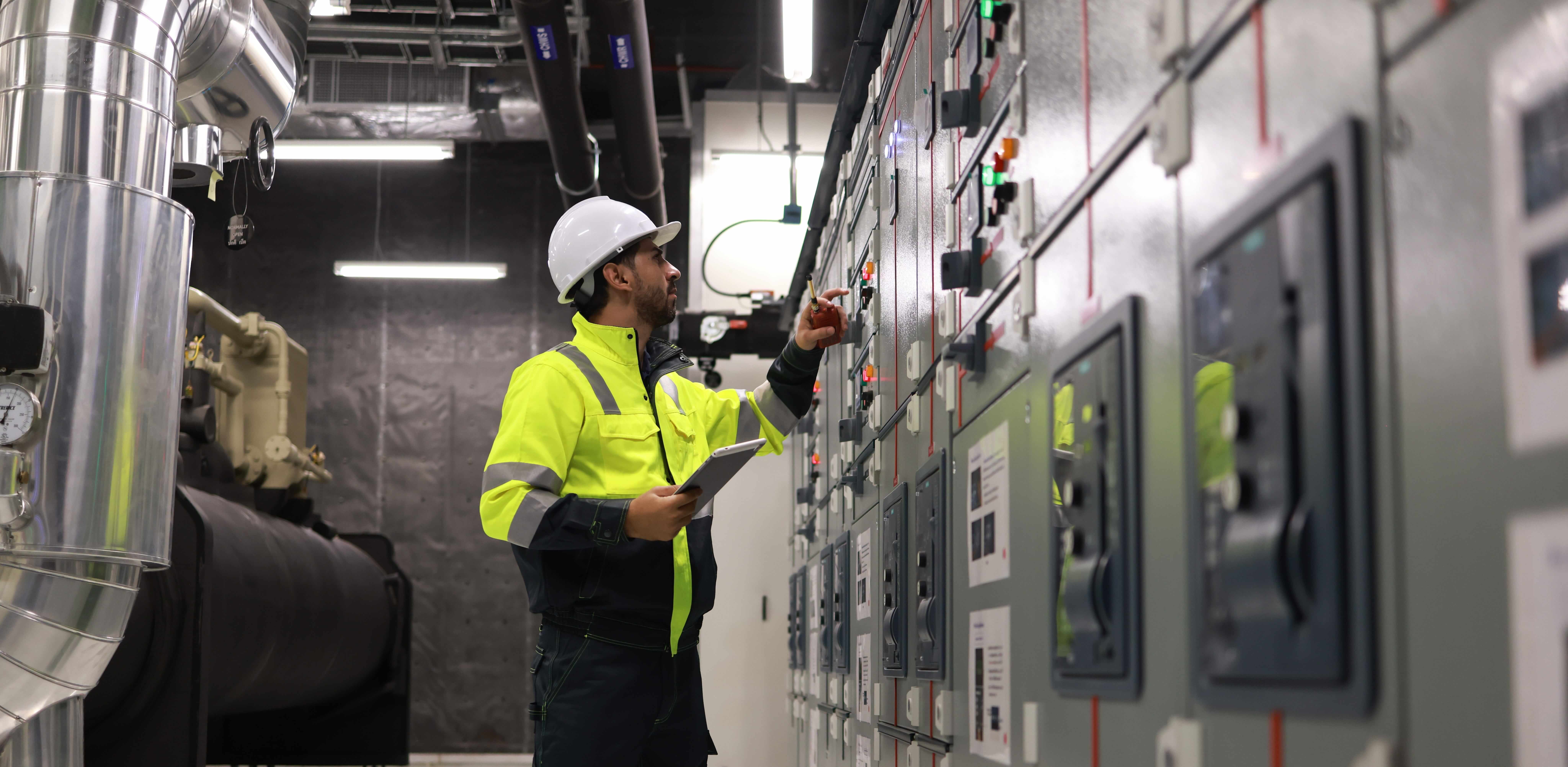 Engineer checking electrical panel