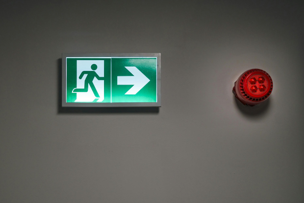 Image of an emergency exit and red alarm