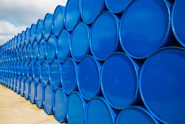 A series of chemical drums stacked on top of eachother